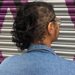 Image of haircut: pattern undercut with chin length curly hair