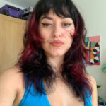 a picture of a longer hair haircut with colour in the lengths of the hair