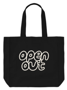 black shopper style bag with Open Out logo printed in white outline writing